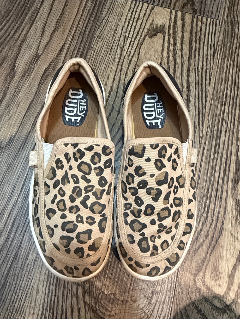 Hey Dude Kids Leopard Print Slip-On Sneakers in Tan and Black
